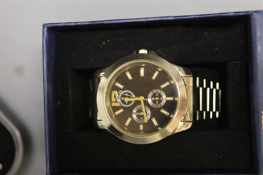 A collection of designer and other quartz wristwatches, including a Casio Wave Ceptor chronograph